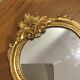 Golden wooden mirror in baroque style
