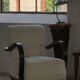 A pair of Swedish Art Deco lounge chairs with curved armrests, 1930s.