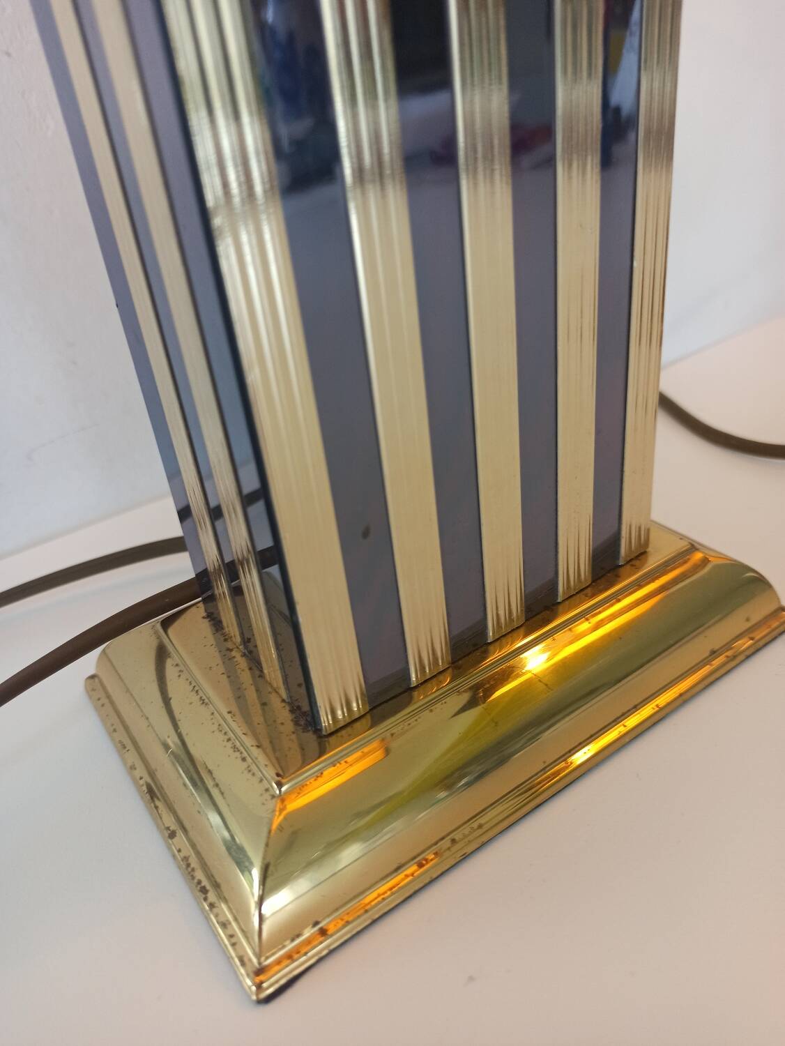 Pair of black and gold art deco style lamps