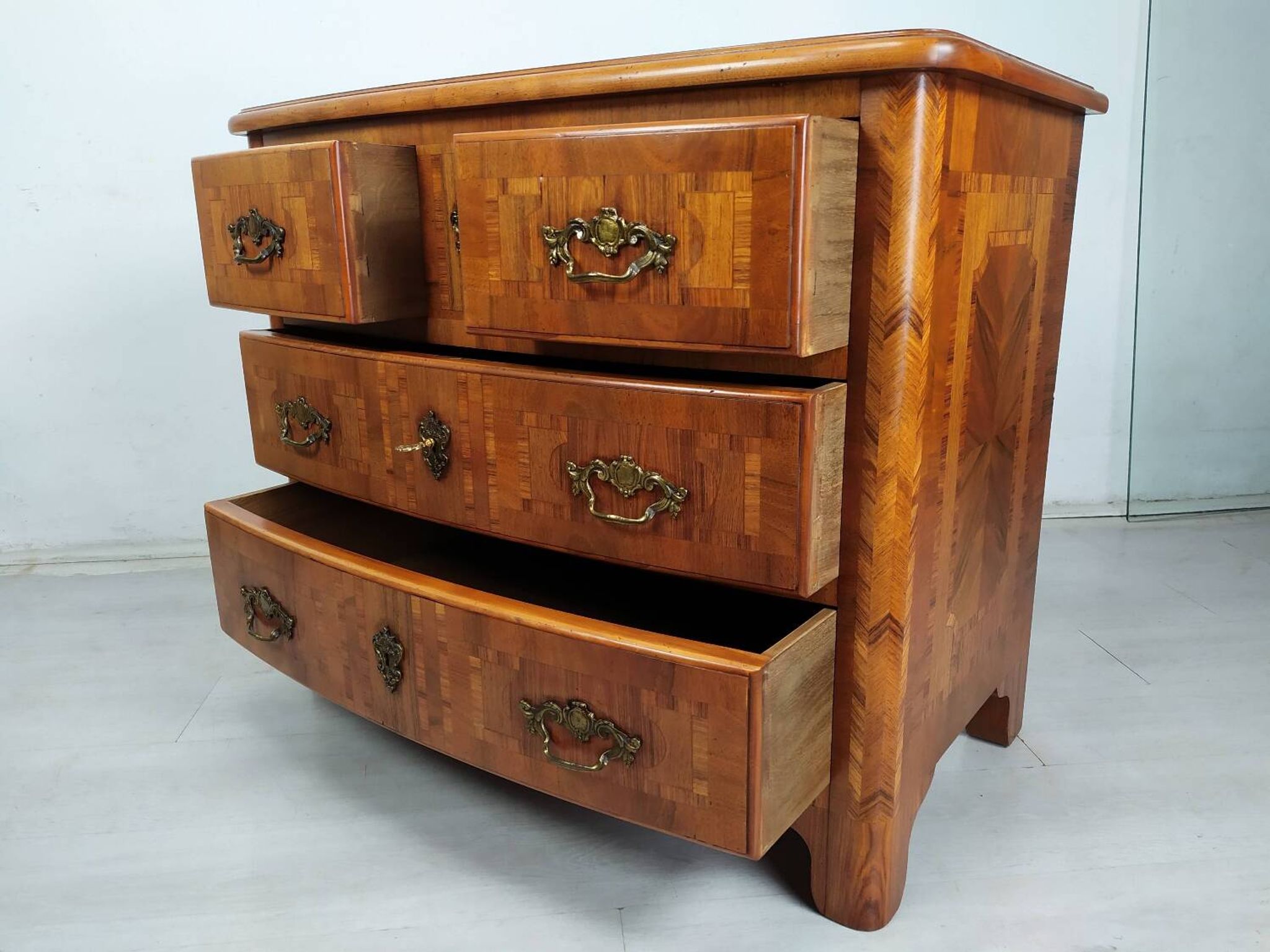 Marquetry style chest of drawers