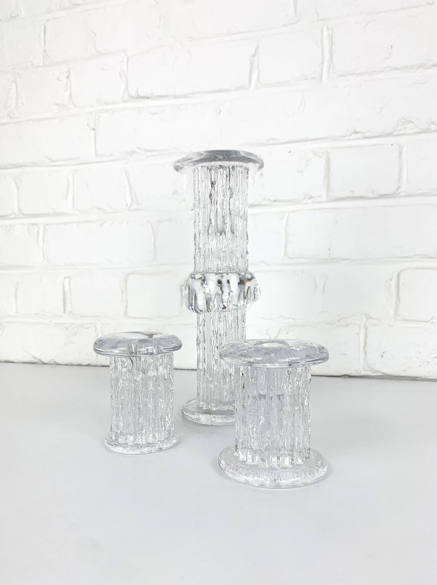 Glass candle holders by Göran Wärff for Kosta Boda, Sweden, 1970s.