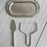 Foie gras set in shiny silver metal