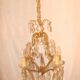 crystal chandelier type with a 4-arm light cage