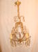 crystal chandelier type with a 4-arm light cage