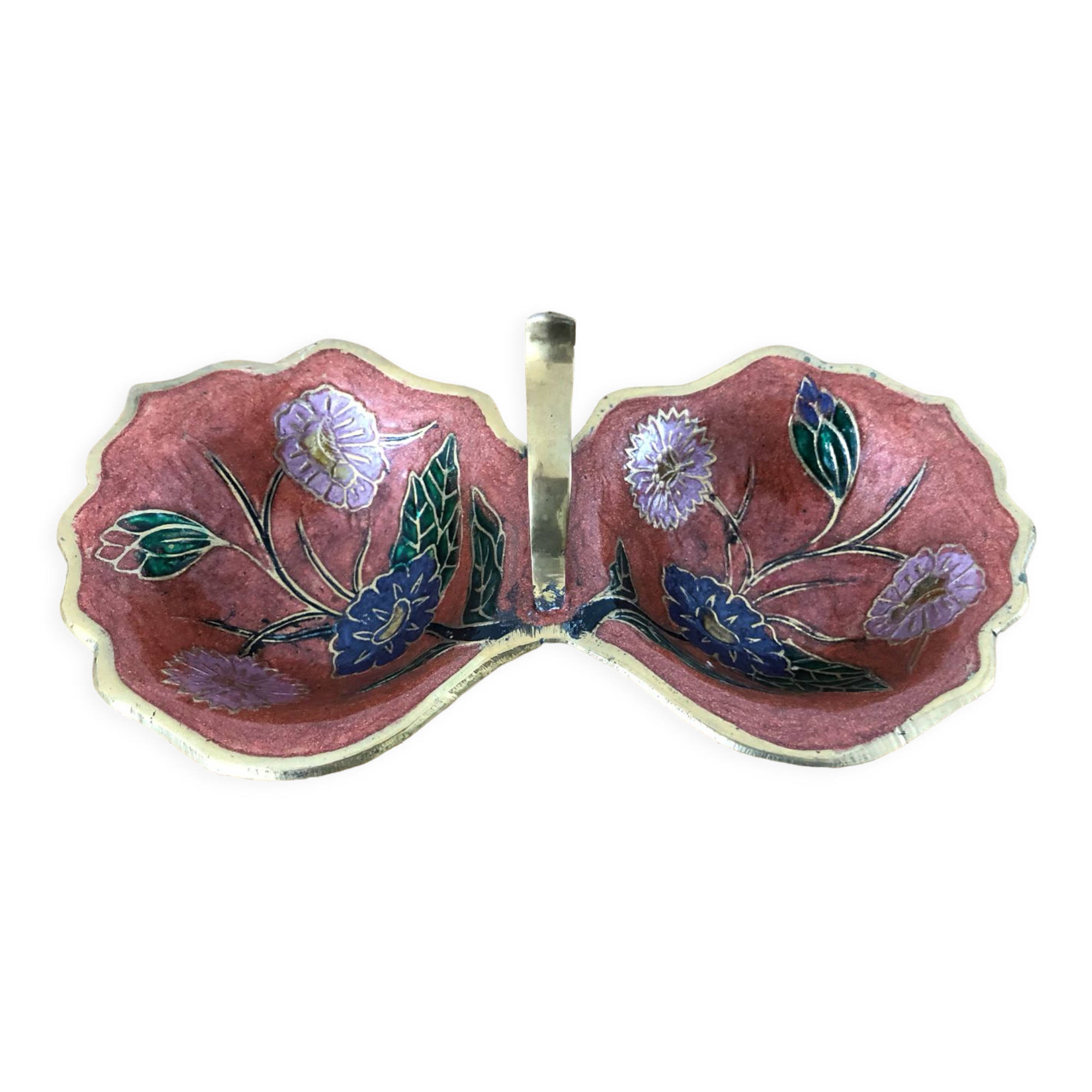 Empty pockets in brass and floral decoration