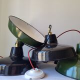 Duo of suspensions in enamelled sheet metal