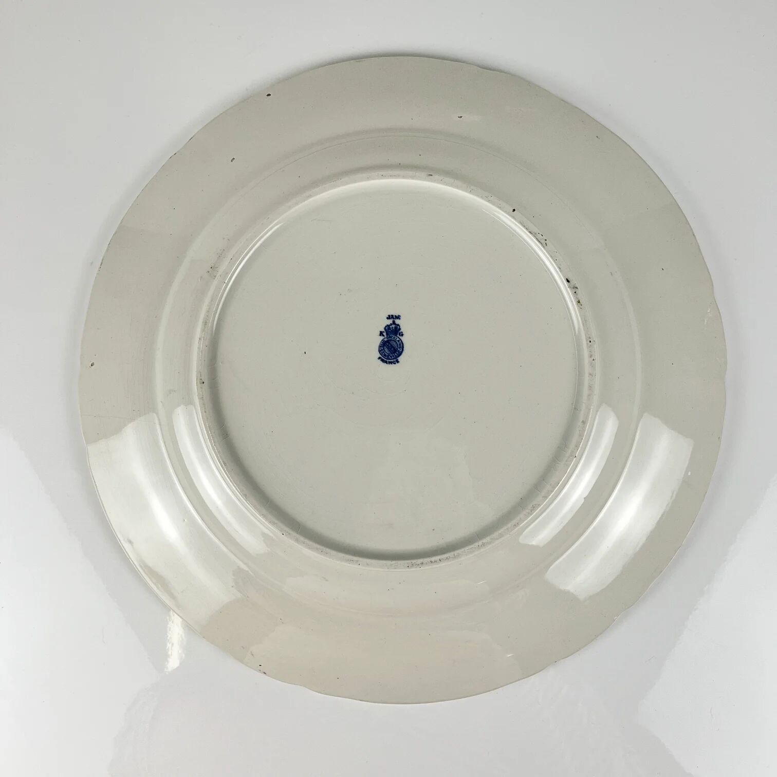 Large round plate Terre de Fer KG Lunéville, model "Jane", blue, 1890-1915.