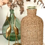Glass bottle and braided rope
