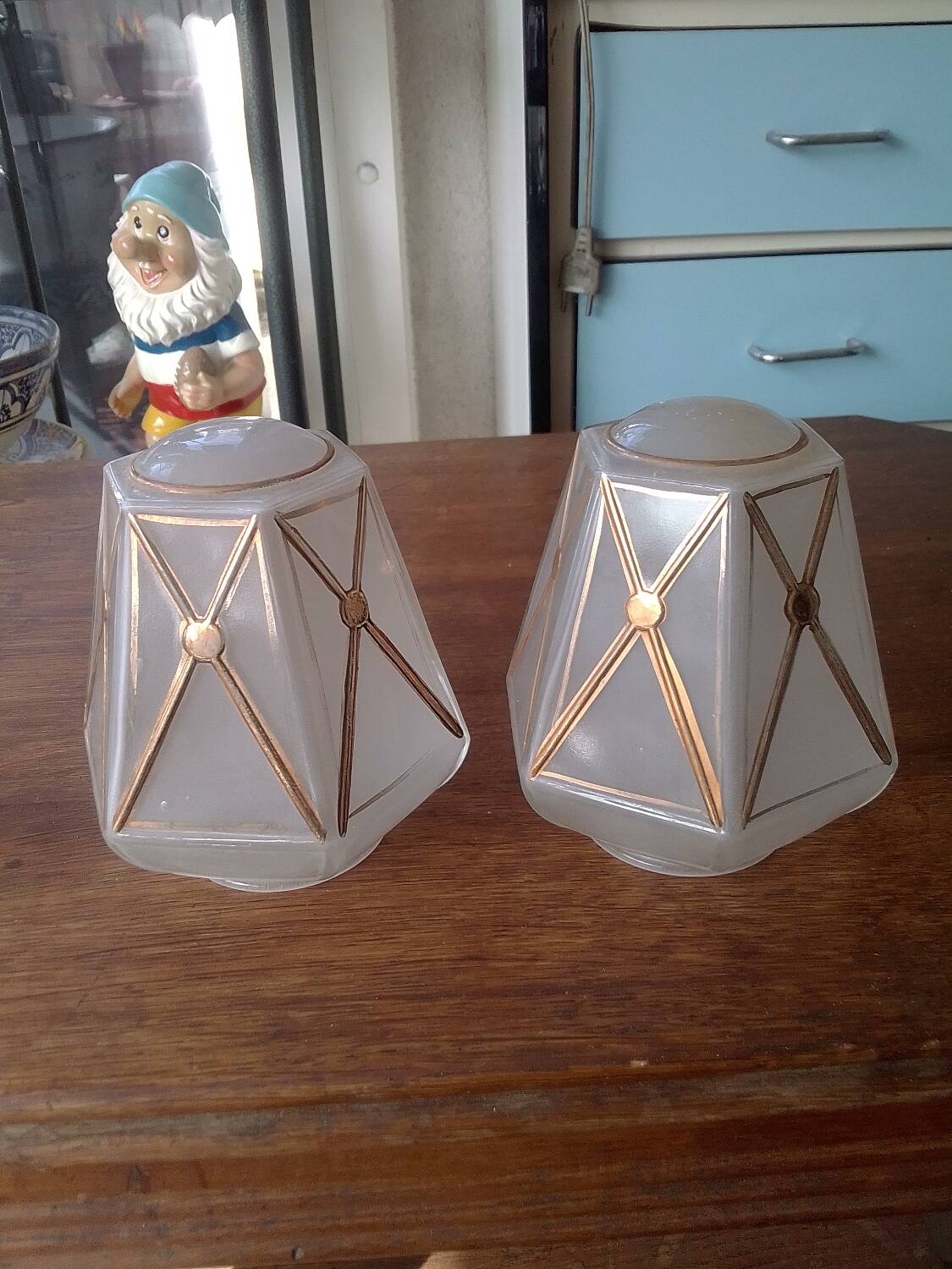 Pair of opalescent and gilded lamp glass