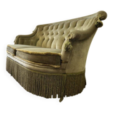 Vintage green two-seater sofa with fringes