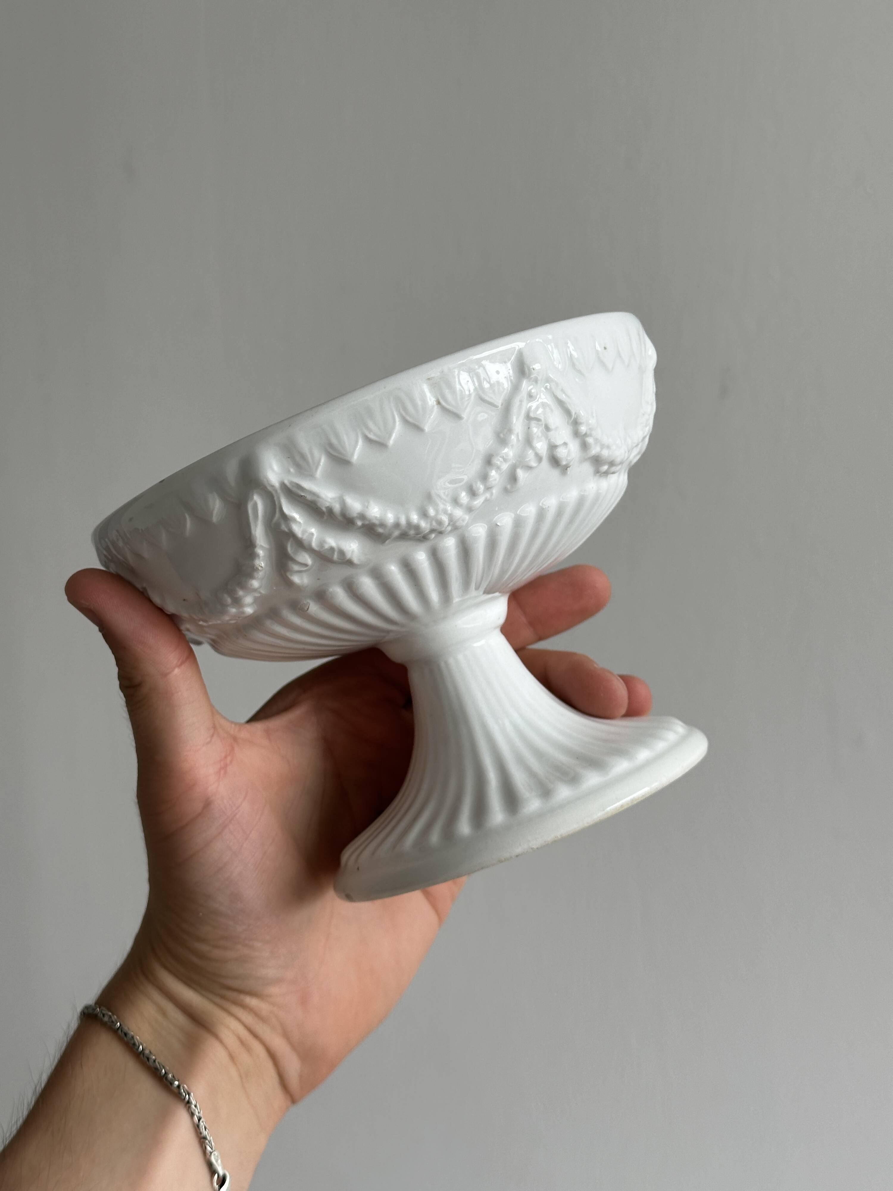 Decorated white porcelain cup