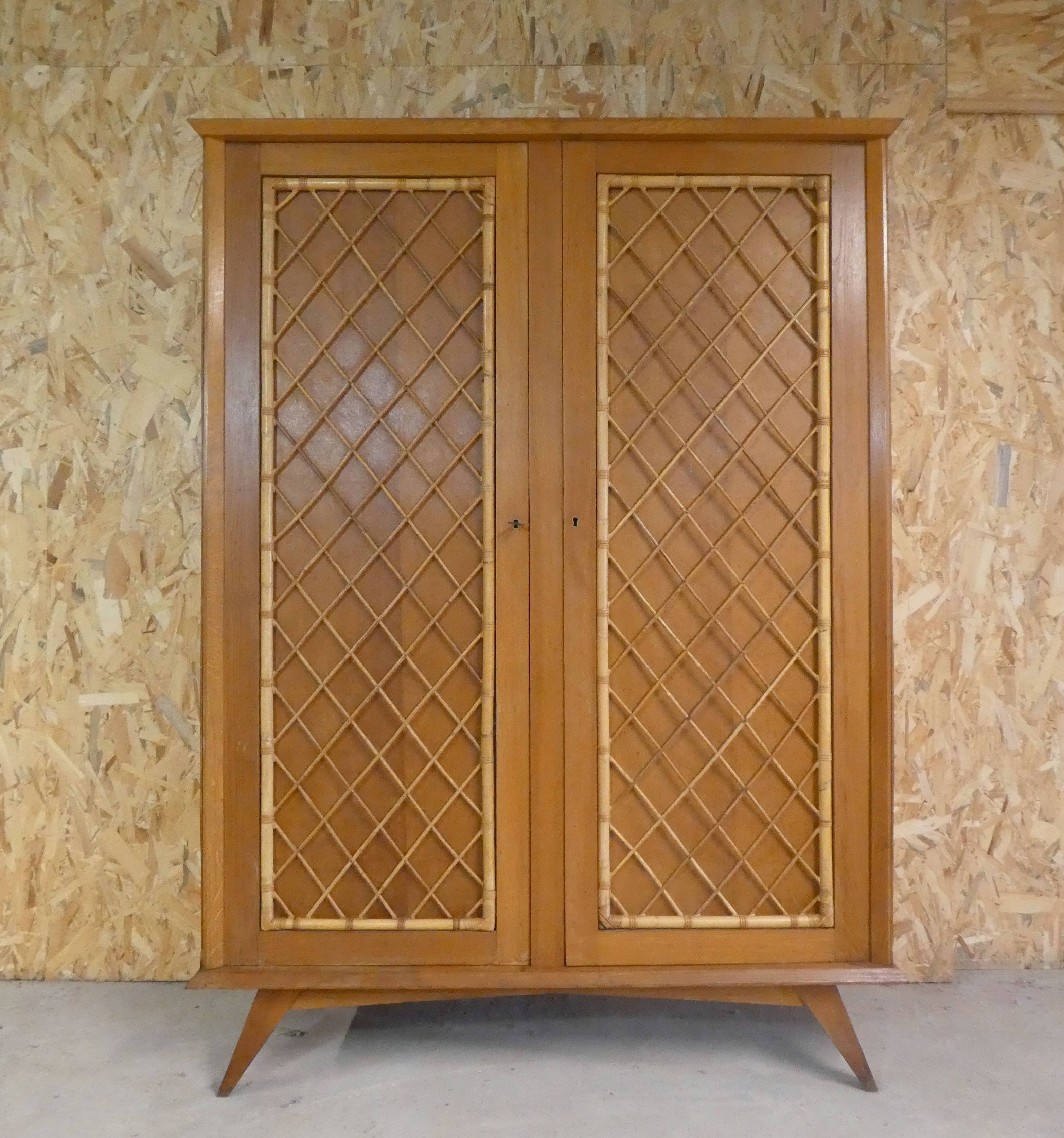 rattan cabinet with compass feet