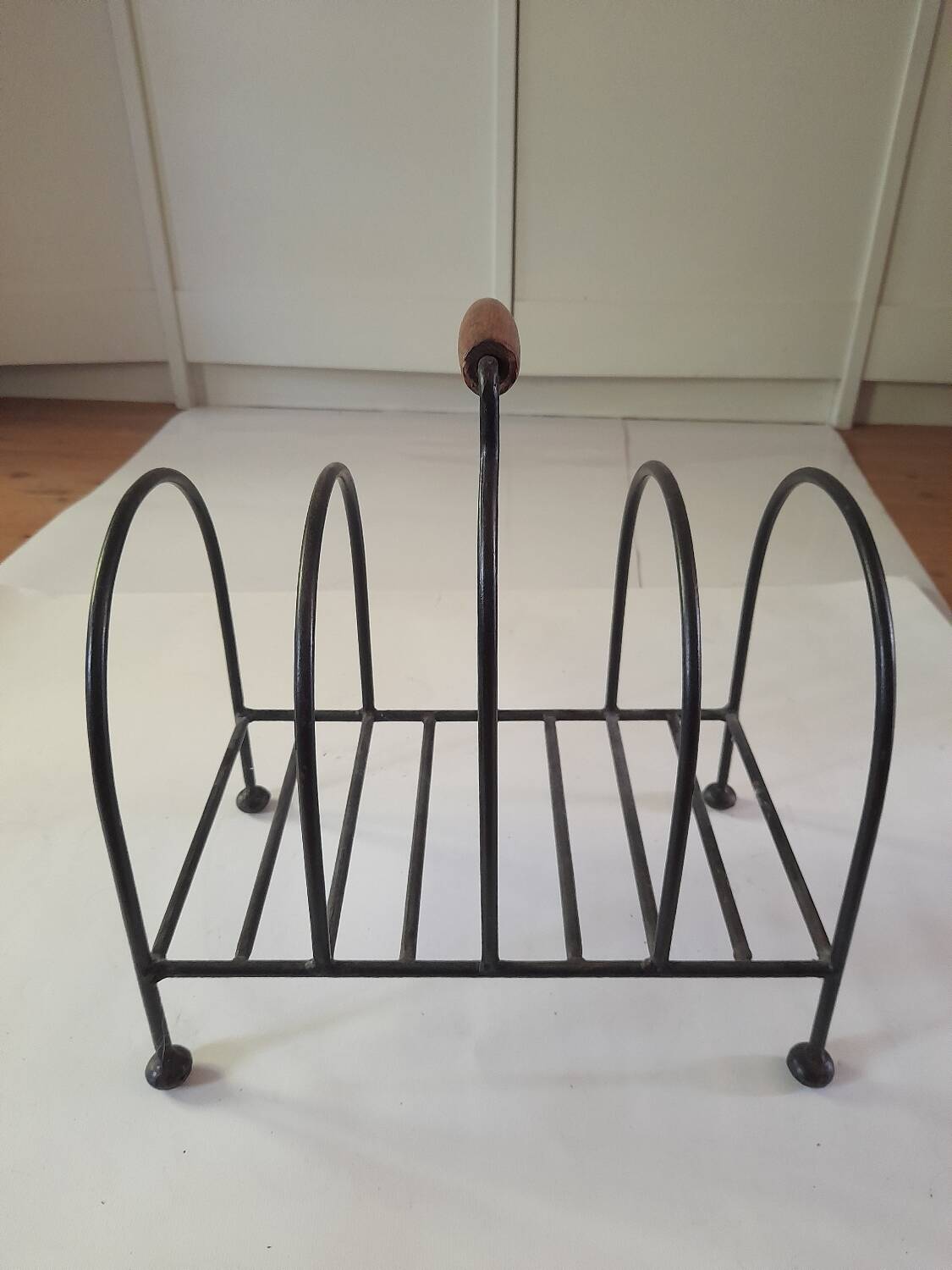 Vintage metal and wood magazine rack