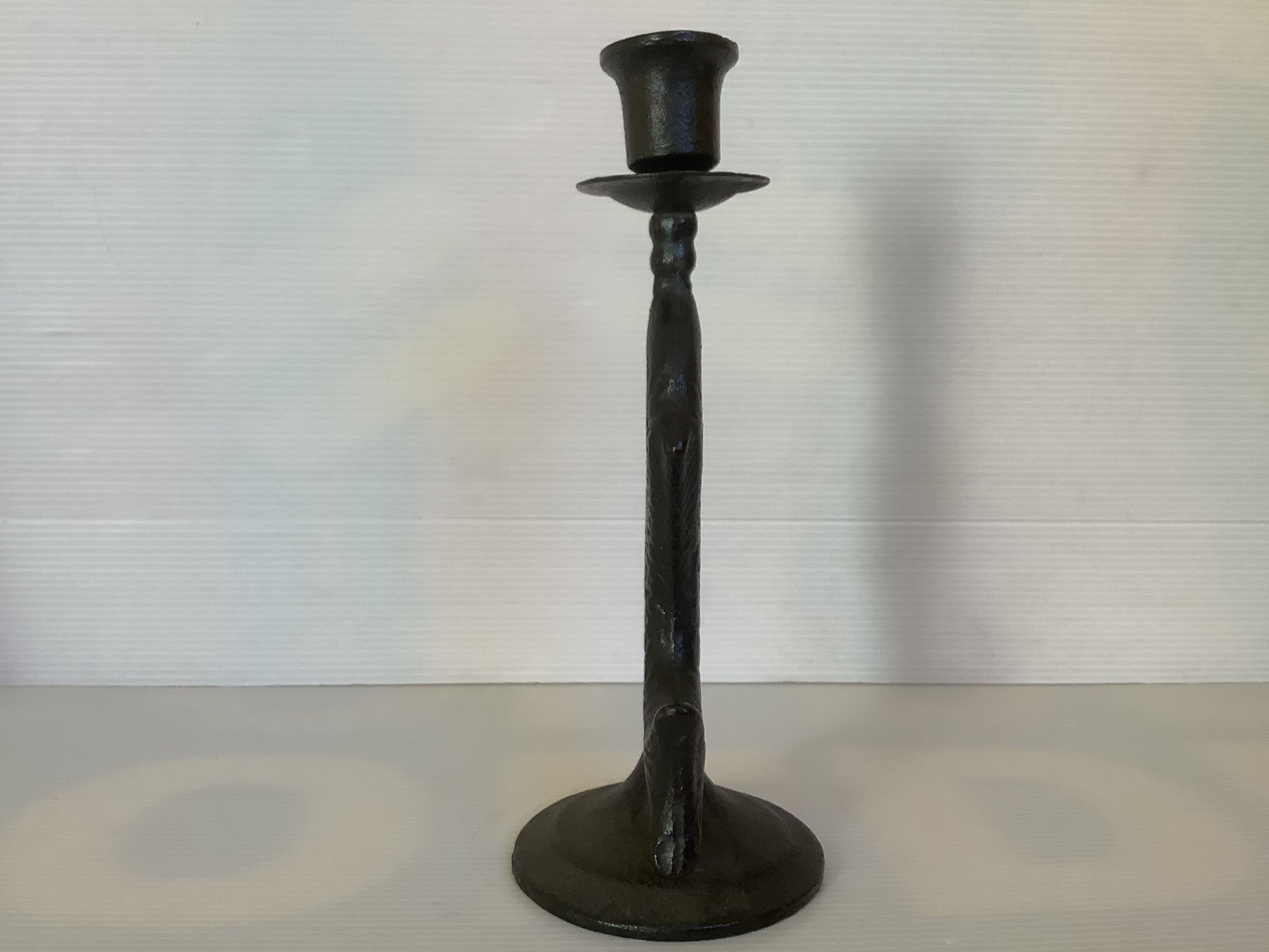 Brutalist black cast iron fish candle holder