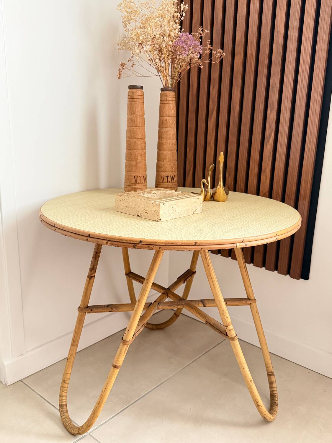 Vintage round tripod side table in rattan
