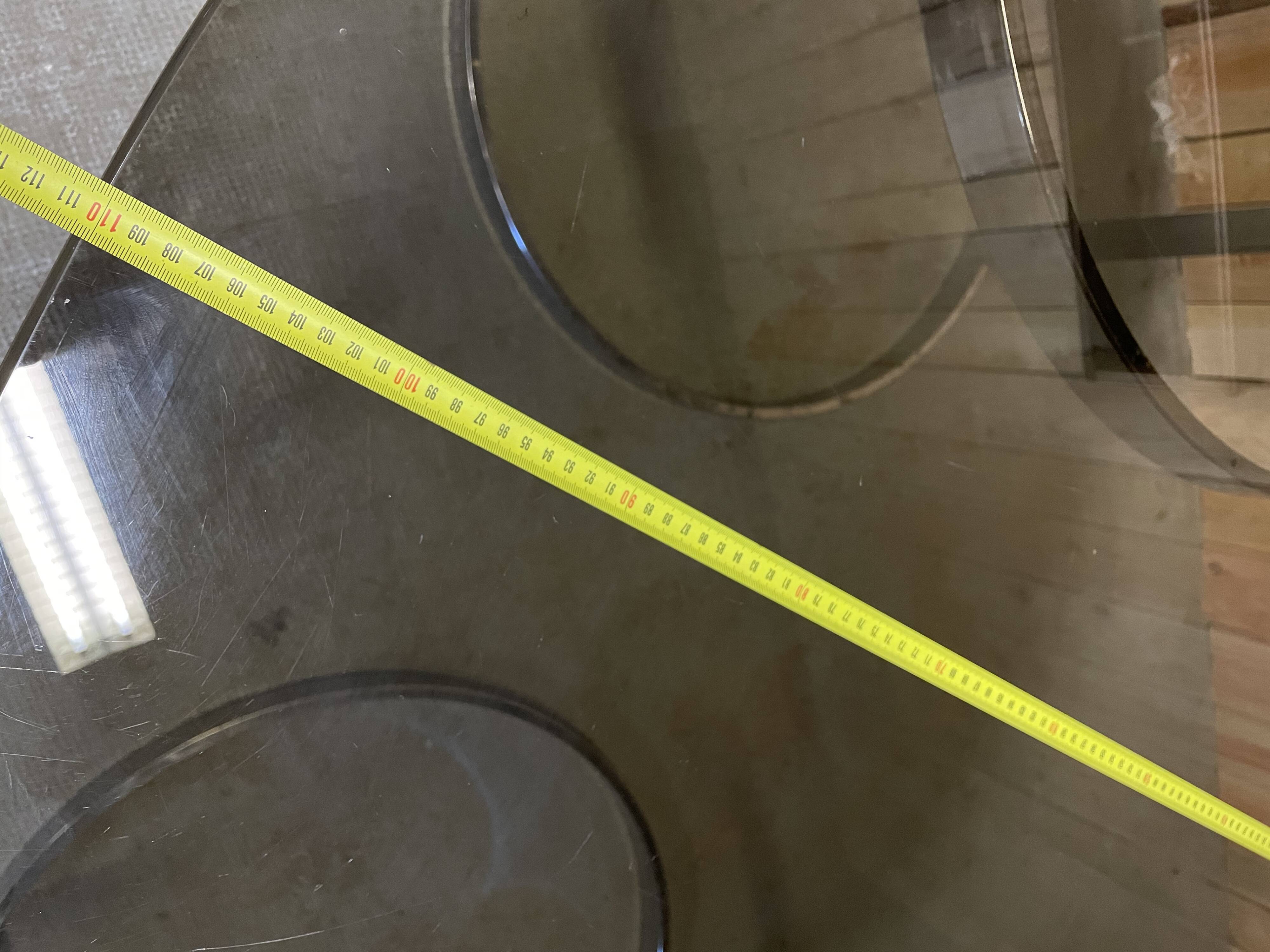 Glass oval dining table by Milo Baughman