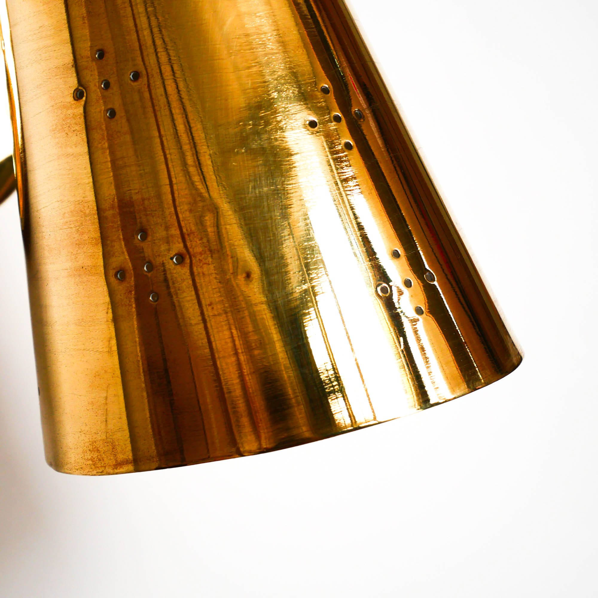 Old conical brass wall lamp, perforated lampshade