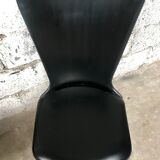 Pair of Baumann model Essor chairs in faux black leather, beech compass footing