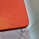 Table in red formica, 4 roc chairs, 2 extension cords, 2 drawers 60