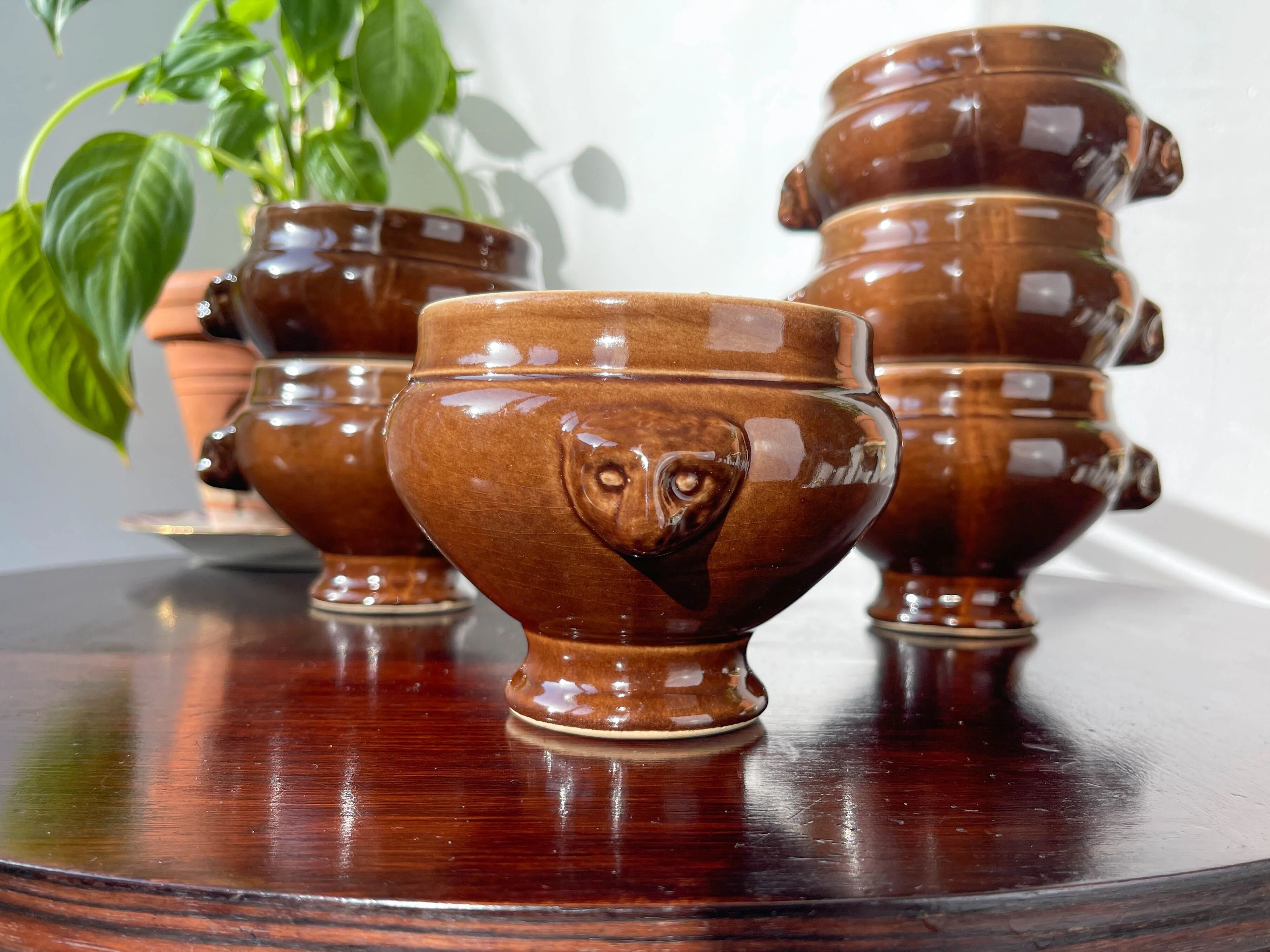 6 vintage Emile Henry lion's head onion soup bowls in ceramic - brown, made in France.