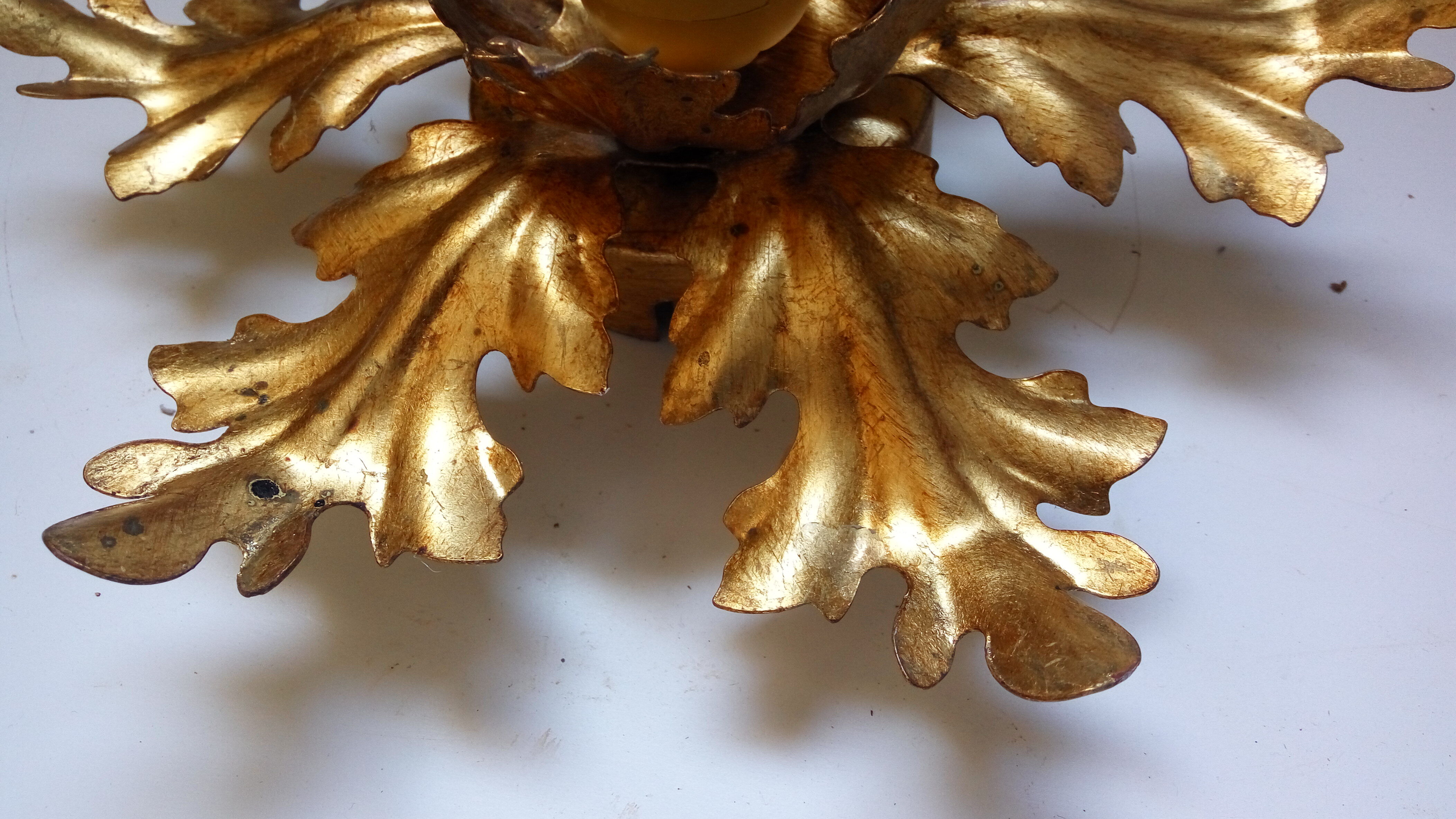 Golden metal wall light
