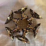Set of 6 stainless steel ice cream bowls by Guy Degrenne with matching spoons.