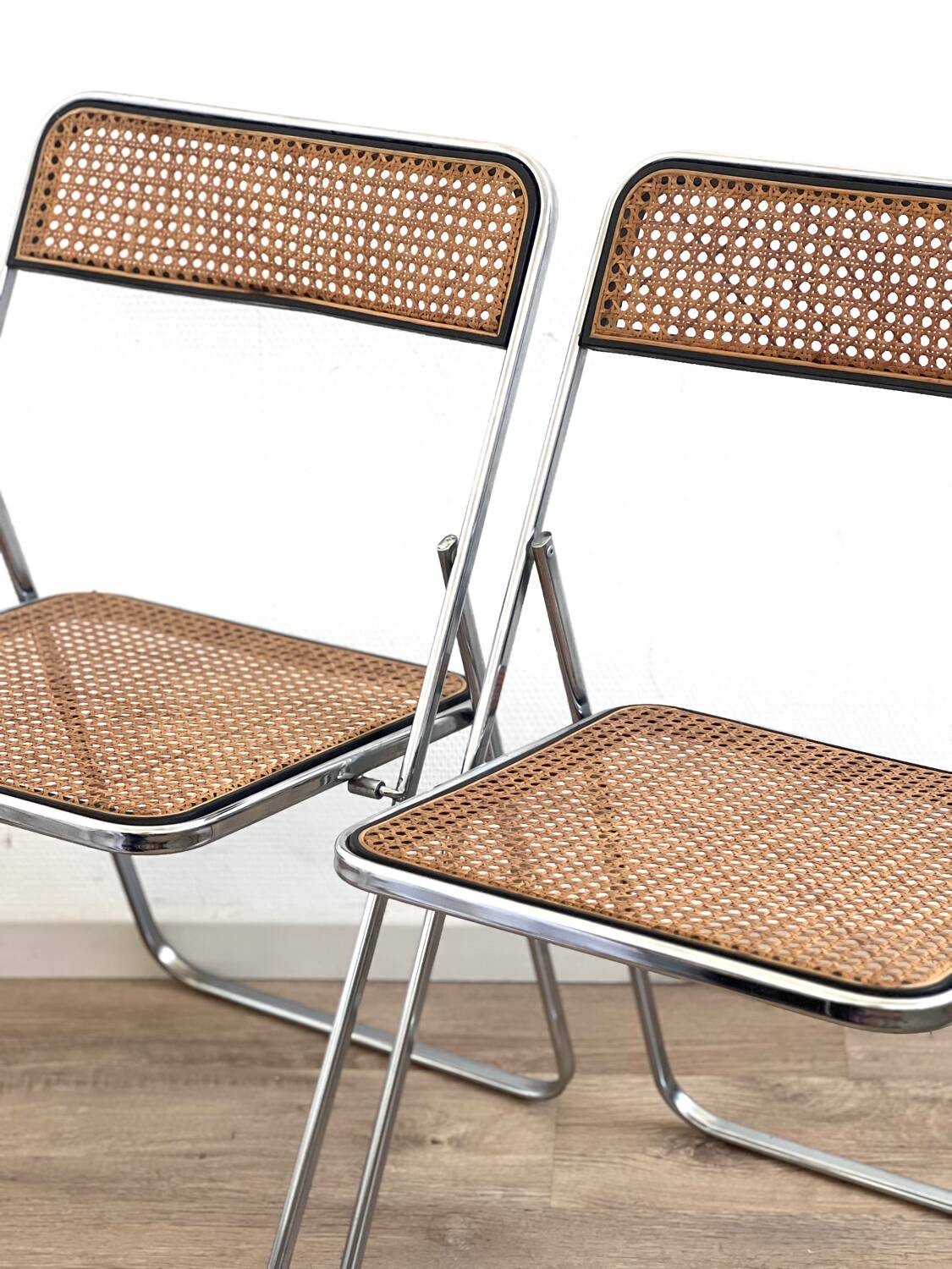 Pair of folding cane chairs