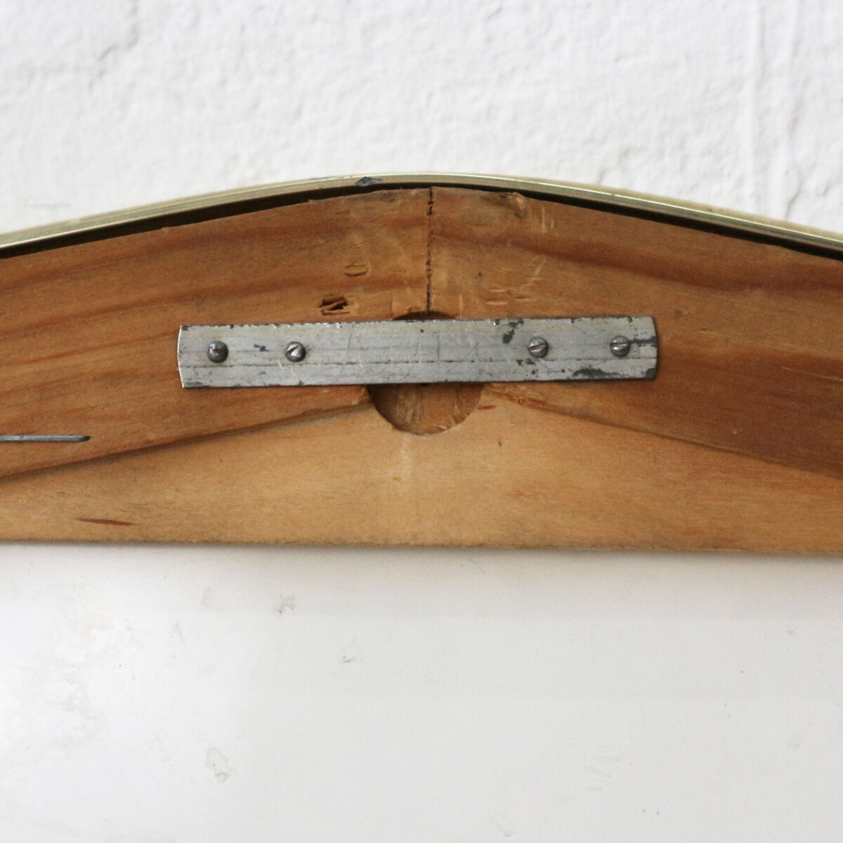 '50s wall mirror with relief brass frame