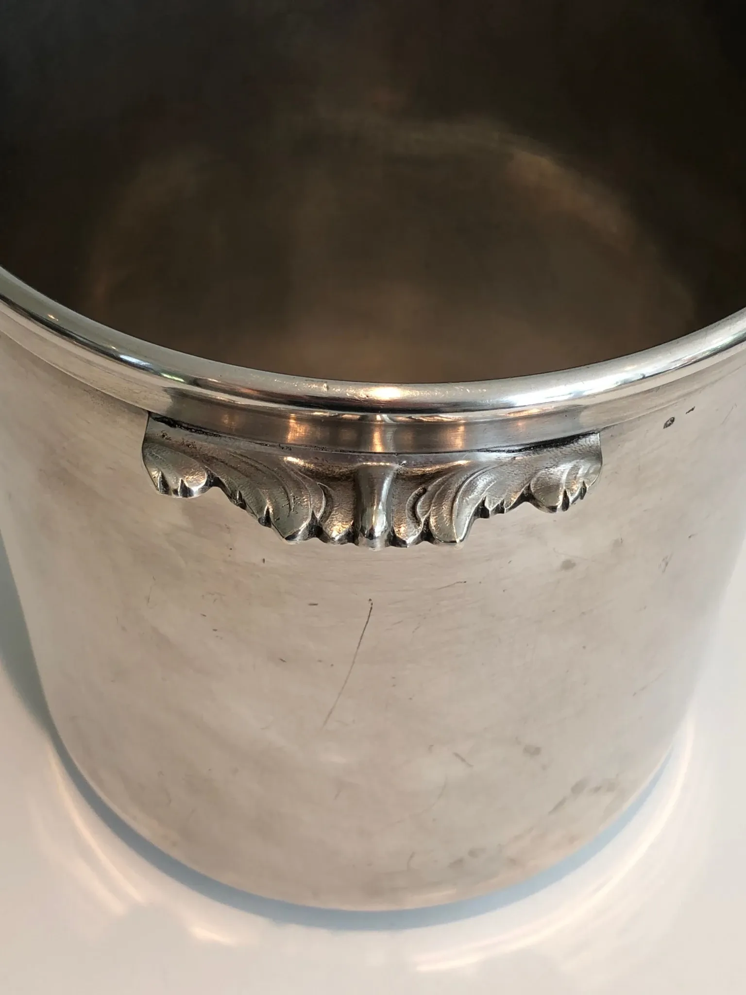 Cylindrical Silver-Plated Champagne Bucket with Small Leaf-Shaped Handles.