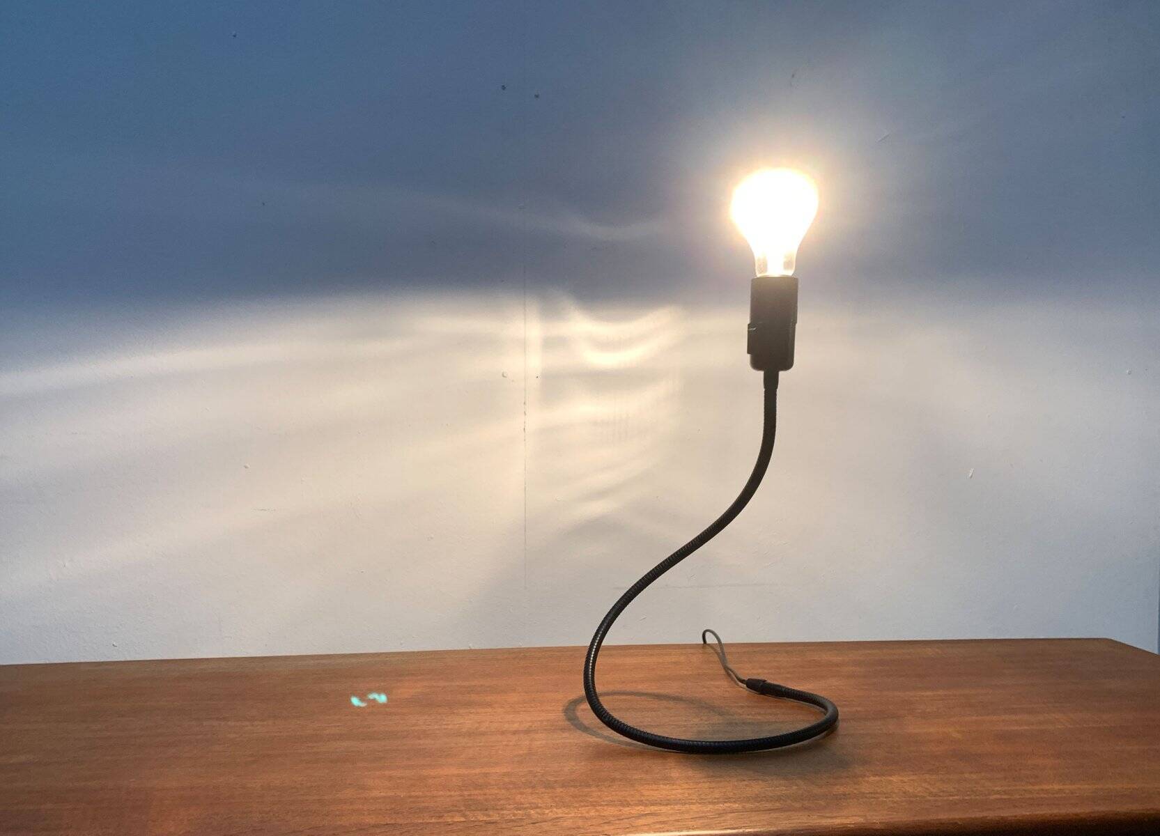 Lightworm minimalist table lamp by Walter Schnepel for Tecnolumen.