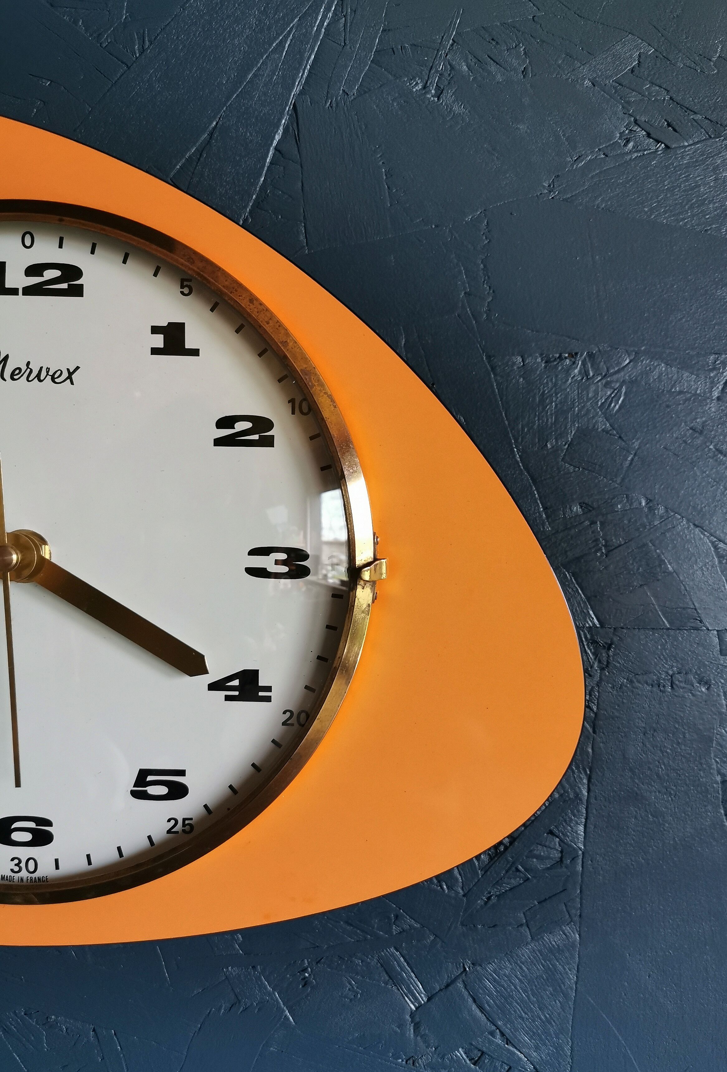 Vintage formica clock asymmetrical silent wall clock "Mervex orange"
