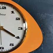 Vintage formica clock asymmetrical silent wall clock "Mervex orange"