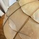 Suspension en nacre et laiton 