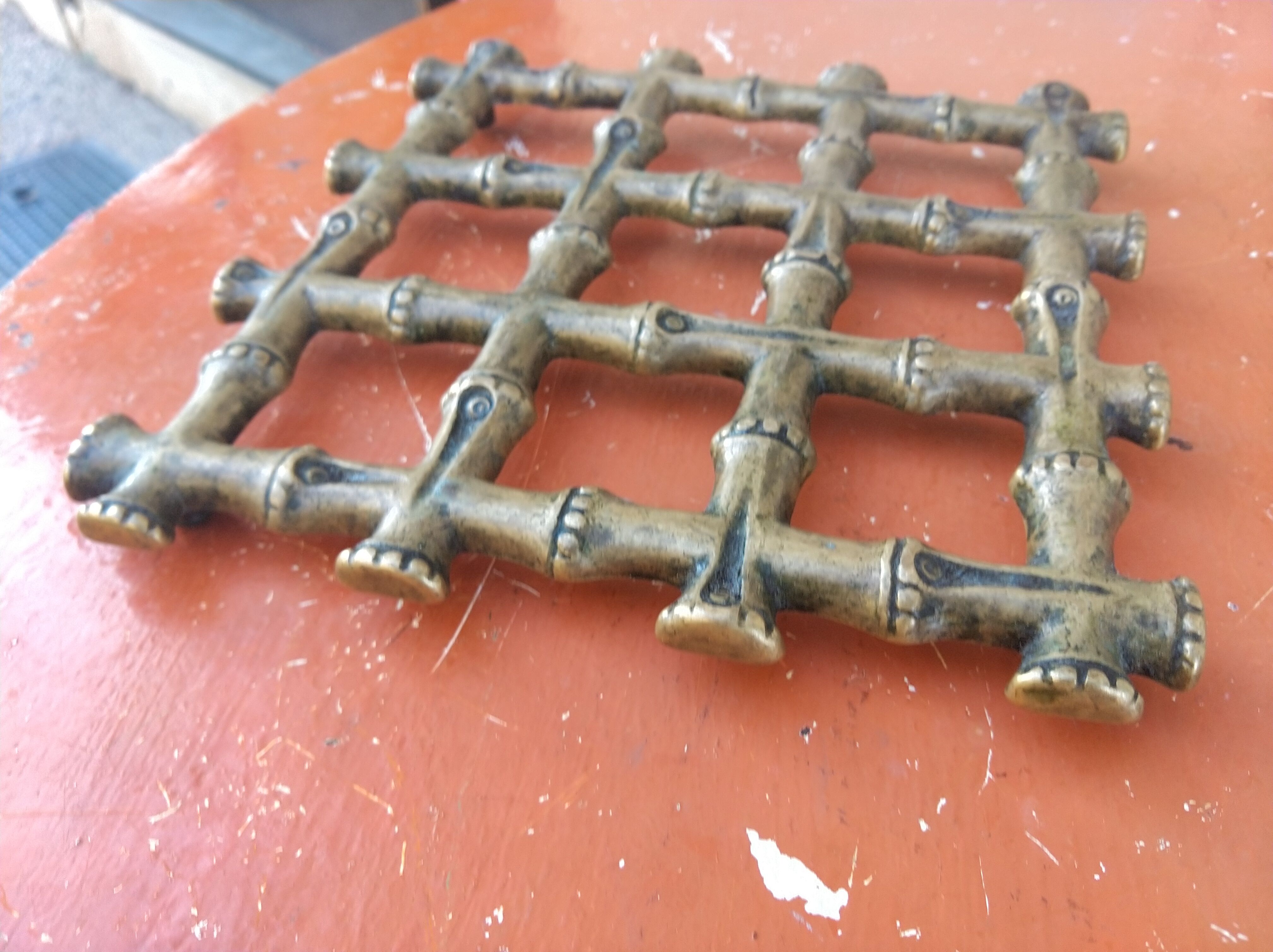 Bronze trivet in the style of bamboo, circa 1960