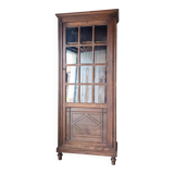 Old glass-fronted library in solid wood