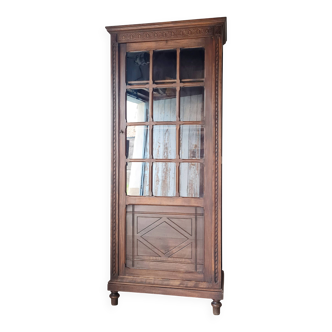 Old glass-fronted library in solid wood