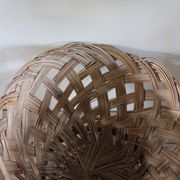 Vintage high round wicker basket with openwork.
