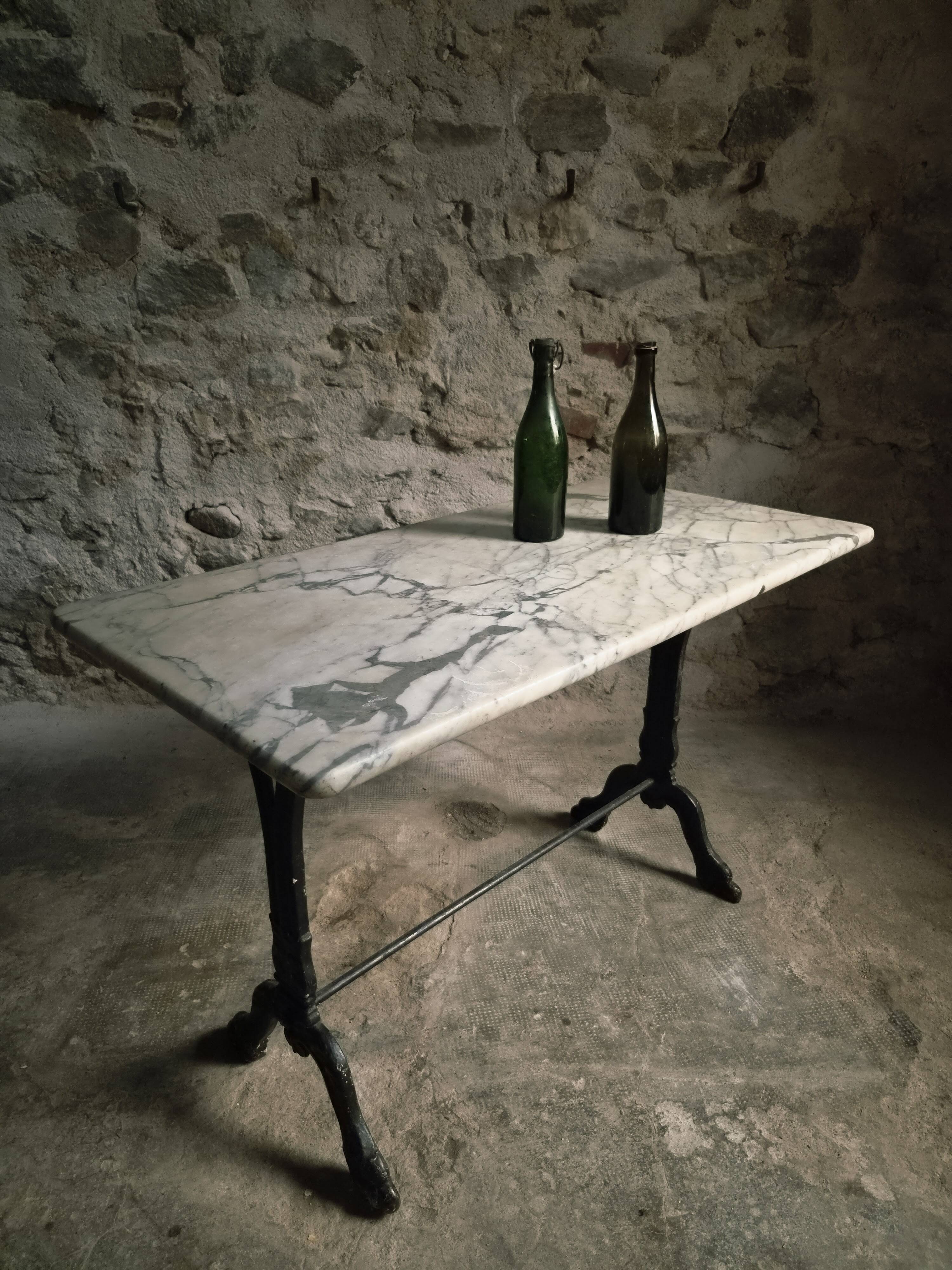 French bistro table made of marble with a cast iron base, 1920s–1930s.