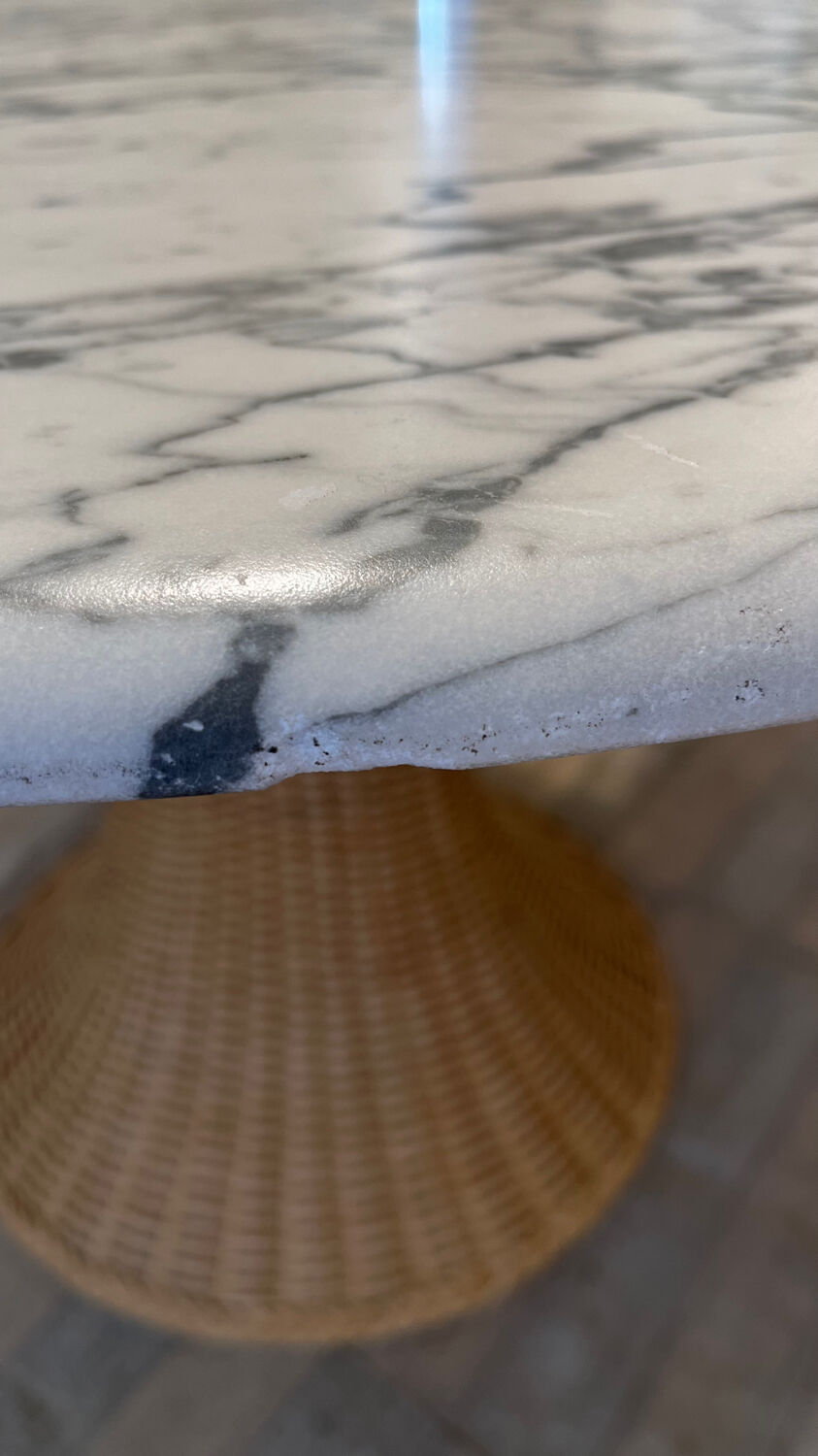 Marble and wicker dining table