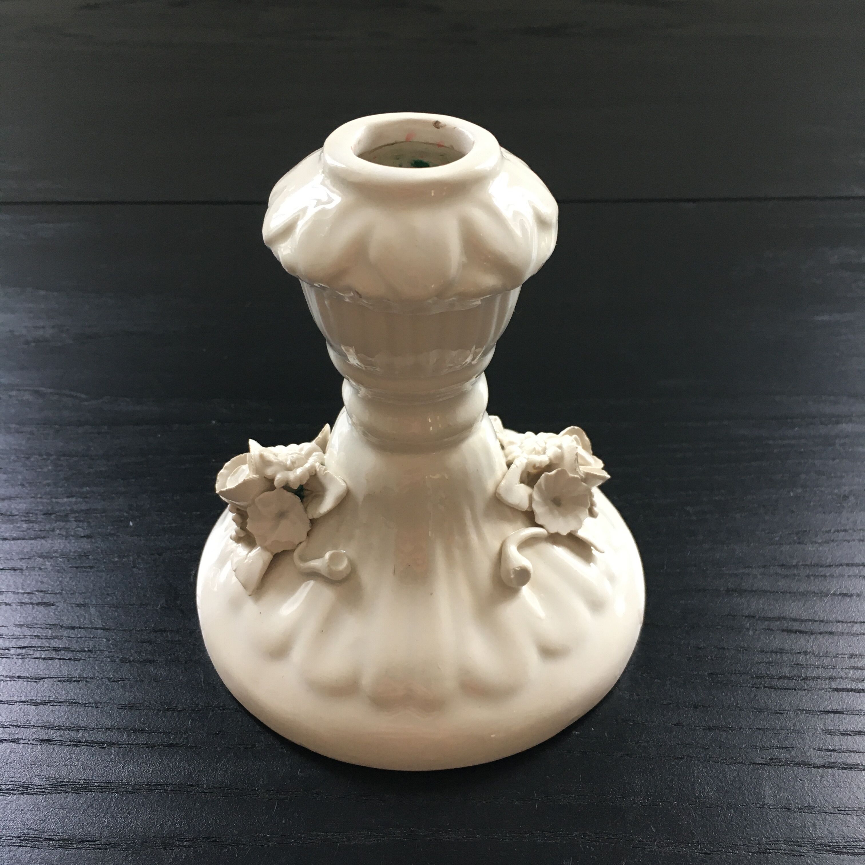 Ivory candle holder with barbotine decor