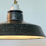 Pair of black and white industrial pendant lights with ceramic sockets