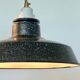 Pair of black and white industrial pendant lights with ceramic sockets