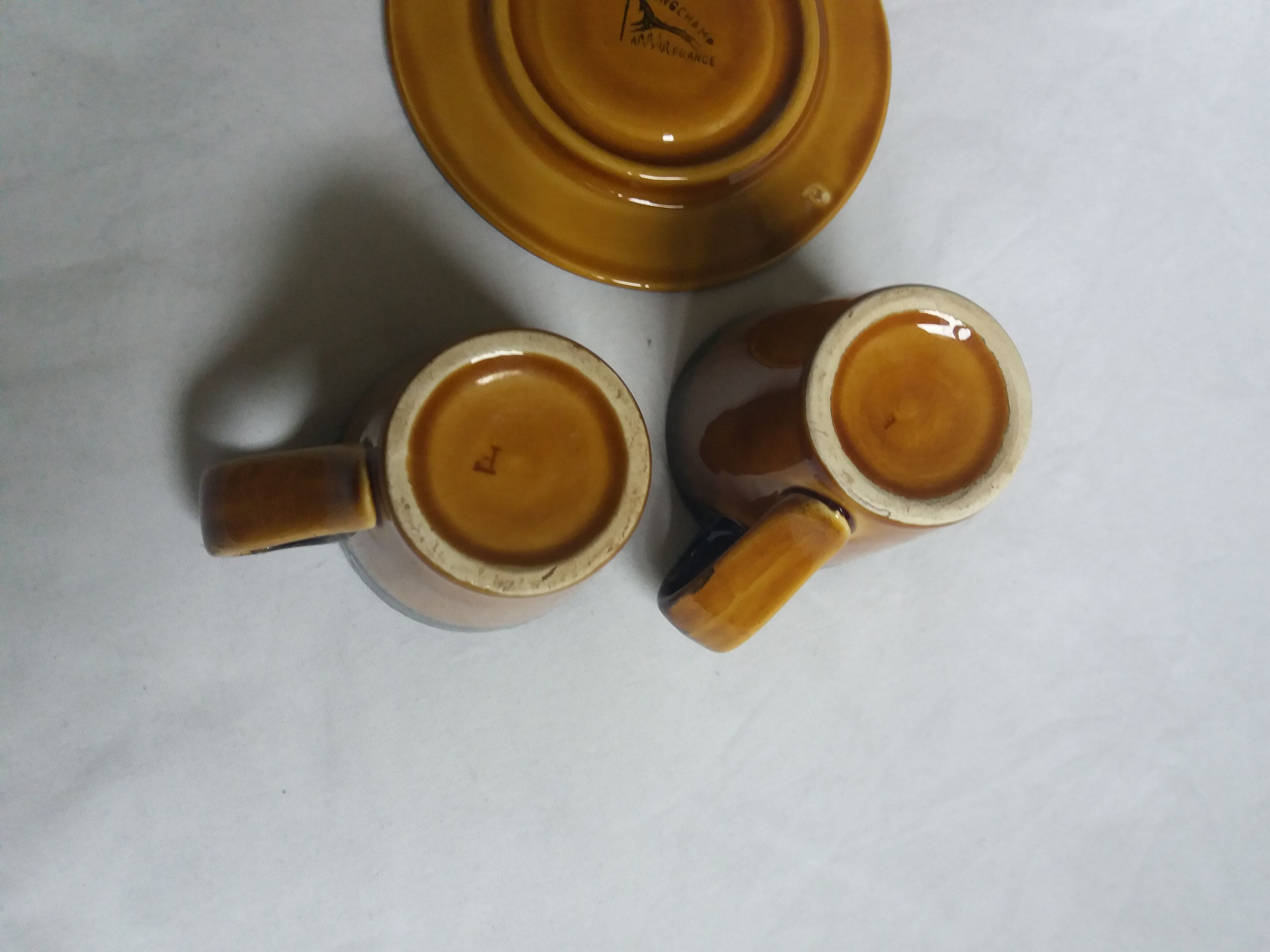 2 Longchamp ceramic coffee cups and saucers