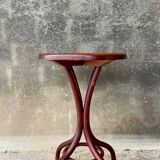Pedestal table in curved wood