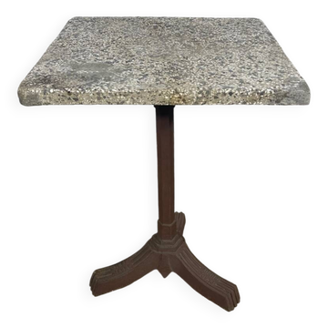 Bistro table with a cast iron base