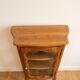 Small silver display cabinet in Louis XV style made of wood.