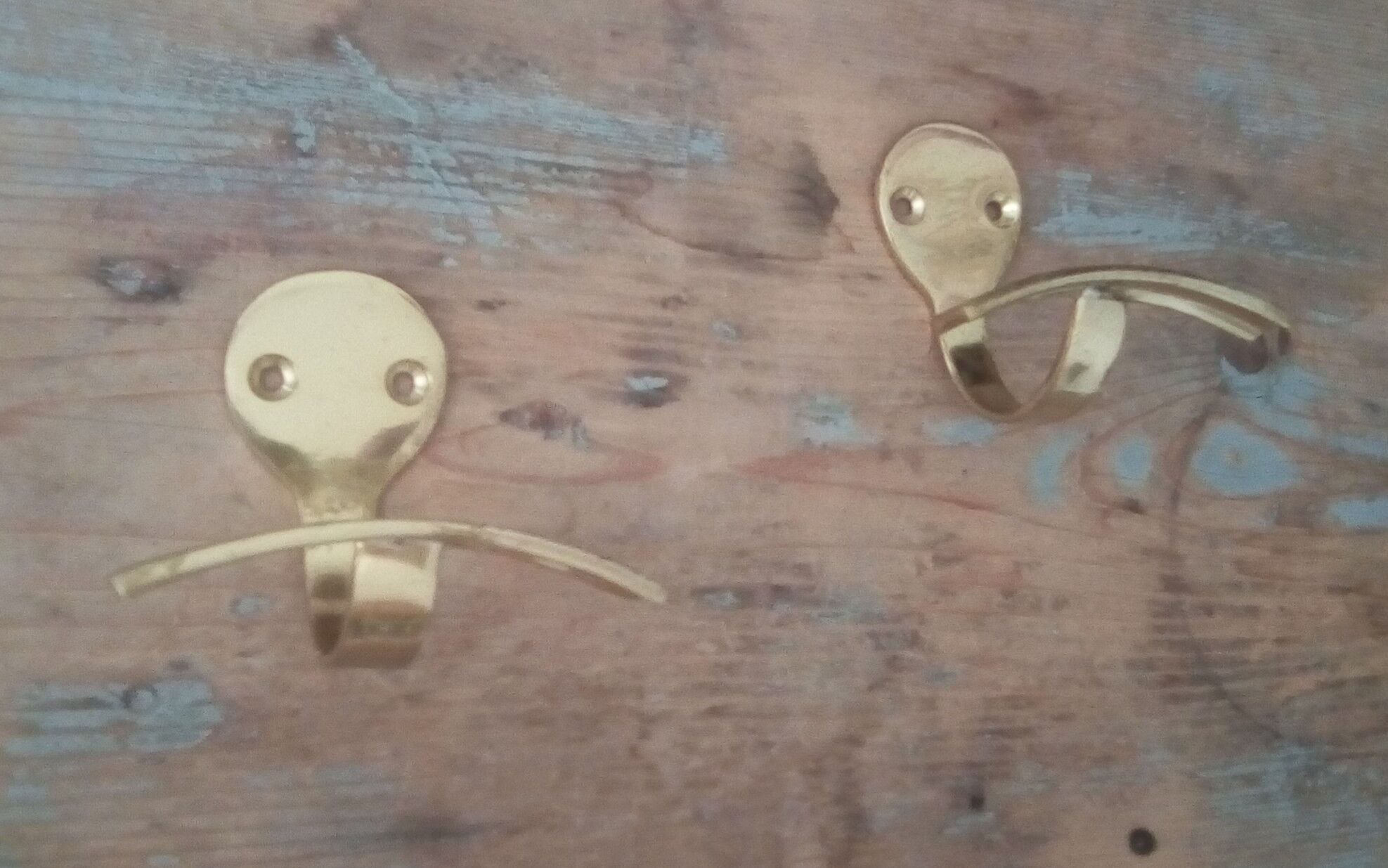 Pair of coat racks in gilded steel 70s/80s