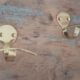 Pair of coat racks in gilded steel 70s/80s
