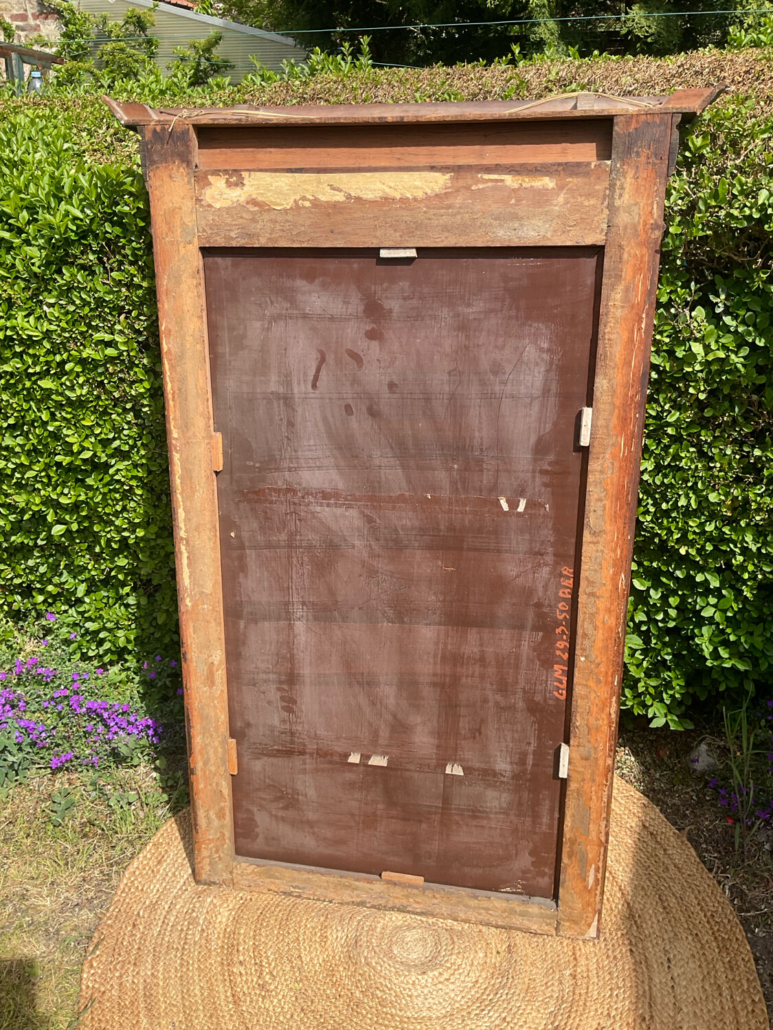 Antique large trumeau mirror in solid wood and bevelled glass.