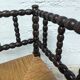 Turned wooden corner chair